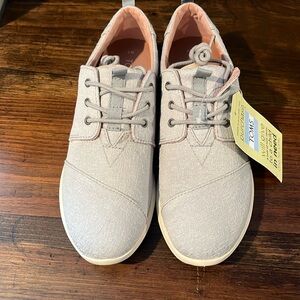 Never worn tags still on TOMS sneakers
